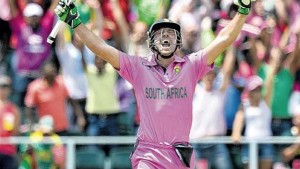 South African batsman AB de Villiers celebrates scoring a century during the second One-Day International against the West Indies at Wanderers cricket ground in Johannesburg yesterday. (PHOTOS: AFP)