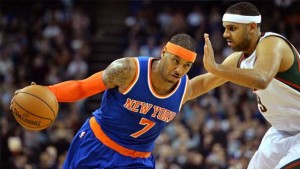 Knicks forward Carmelo Anthony drives past Bucks defender Jared Dudley.