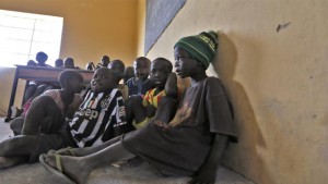 Children displaced as a result of Boko Haram attack in the northeast region of Nigeria, attend a class at Maikohi secondary school camp for internally displaced persons (IDP) in Yola, Adamawa State January 13, 2015. 