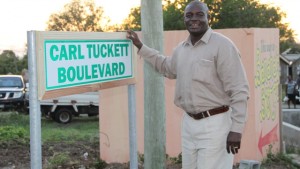 Carl Tuckett unveils the road sign in his honour on February 03, 2015