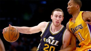 The Jazz's Gordon Hayward drives against the Lakers' Ed Davis.