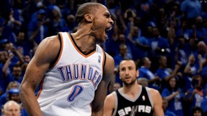 Russell Westbrook lets out a scream after scoring ahead of the Spurs' Manu Ginobili (r.) as the Thunder win Game 3.