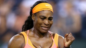 Serena Williams celebrates a point in the final game against Monica Niculescu of Romania during day five of the BNP Paribas Open at the Indian Wells Tennis Garden on March 13, 2015. (Photo by Matthew Stockmvan/Getty Images) / Getty Images