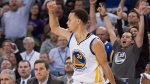 Warriors guard Stephen Curry celebrates after a play against the Lakers during the fourth quarter.