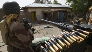 A soldier from Niger patrols in Malam Fatori, in northeast Nigeria, which was retaken from Islamist Boko Haram militants by troops from neighbouring Chad and Niger, on April 3, 2015 (AFP Photo/Philippe Desmazes) 