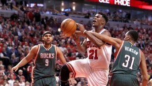 Chicago Bulls guard Jimmy Butler is fouled by Milwaukee Bucks centre John Henson as he drives to the net Monday. 