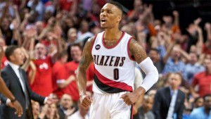 Trail Blazers guard Damian Lillard reacts after making a 3-pointer against the Grizzlies during the fourth quarter in Game 4.