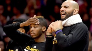 The looks the faces of the Lakers' Dwight Buycks (left) and Carlos Boozer say it all about Tuesday's game ... and this season.