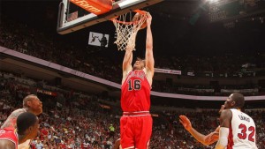 The Bulls' Pau Gasol dunks against the Heat.
