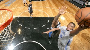 The Nets' Thaddeus Young goes up for a shot against the Magic.