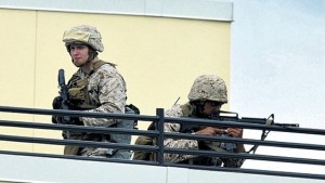 United States Marines take up position on the roof of the embassy.