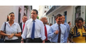 New York Governor Andrew Cuomo (2nd-L) walks along Old Havana, on April 20, 2015. A delegation of the US state of New York, led by Democrat Governor Cuomo, arrived in Cuba as talks between the two countries continue on trying to re-establish diplomatic ties which have been frozen for five decades. AFP PHOTO /Yamil LAGE (Photo credit should read YAMIL LAGE/AFP/Getty Images) | YAMIL LAGE via Getty Images