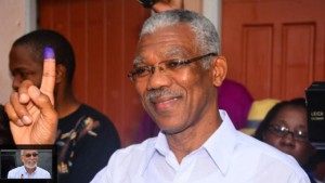 Presidential Candidate of the A Partnership for National Unity and Alliance For Change (APNU+AFC) David Granger displays his inked finger after voting at the Enterprise Primary School Georgetown Guyana, Monday, May 11, 2015. A party in power for over two decades in Guyana faced off in general elections Monday against a new coalition of opposition parties that seeks to challenge a tradition of racial politics and accuses the government of mismanagement and corruption. (AP Photo/Adrian Narine)