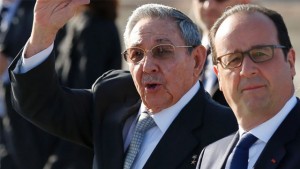  Cuba's President Raul Castro waves to the press as he accompanies France's President Francois who is departing Jose Marti airport in Havana, Cuba, Tuesday, May 12, 2015. Hollande's one-day trip made him the first French president to visit Cuba since it became an independent country. (AP Photo/Desmond Boylan) 