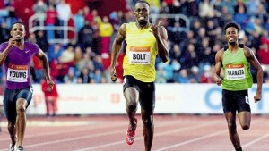 Jamaica sprinter Usain Bolt (centre), Carvin Nkanata of Kenya, (right) and Isiah Young of the United States compete during the 200m at the IAAF World Challenge Zlata Tretra (Golden Spike) athletics tournament in Ostrava yesterday. (PHOTO: AFP)