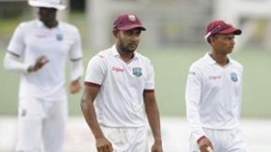 Leg-spinner Devendra Bishoo (left) and Shane Dowrich appear dejected as they walk off following Australia's fightback on Thursday. (Photo: WICB Media)
