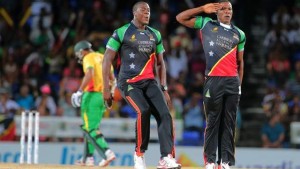 Basseterre, St Kitts - 8th July: SHELDON COTTRELL salutes during a match between St. Kitts and Nevis Patriots and Guyana Amazon Warriors as part of week 2 of the Hero Caribbean Premier League 2015 at Warner Park on July 8th, 2015 in Basseterre, St. Kitts. (Photo by Ashley Allen/CPL)