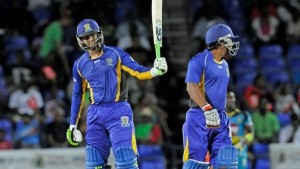Man-of-the-Match: Shoaib Malik’, left, celebrates reaching his half century which set up a 15-run win for the Barbados Tridents over the St Lucia Zouks in the Caribbean Premier League at Warner Park, Basseterre, St Kitts, on Wednesday. —Photo: CPL T20 Ltd