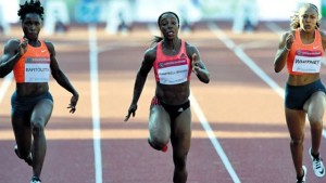 Gold medallist Veronica Campbell Brown (centre) of Jamaica competes with second-placed Tianna Bartoletta (left) of the USA, and Kaylin Whitney also of the USA during the women’s 100 metres final of the Gyulai Istvan Memorial – Hungarian Athletics Grand Prix at the athletic centre of Szekesfehervar, Hungary, yesterday. (PHOTO: AFP)