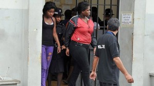 Women accused of prostitution leave the San Fernando Magistrates Court earlier this year. Photo: DEXTER PHILIP