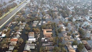 Thousands of houses in New Orleans, Louisiana remain under water one week after Hurricane Katrina went through Louisiana, Mississippi, and Alabama in this September 5, 2005 file photo. 