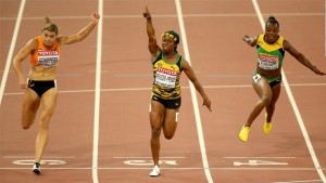 THE FINISH! Shelly-Ann Fraser-Pryce (centre) at the end of the 100m getting the job done over (left) silver medallist Dafne Schipper and Veronica Campbell Brown who finished fourth.