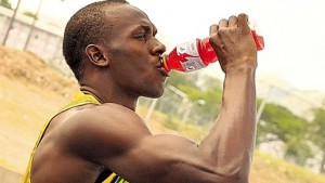 Usain Bolt takes a sip of Gatorade during a promotional shoot in Kingston.