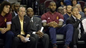 LeBron James says he won't be sitting on the bench when the season tips off Tuesday.