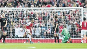 Arsenal’s Chilean striker Alexis Sanchez (second left) reacts after scoring his second and the team’s third goal during the English Premier League football match against Manchester United at the Emirates Stadium in London yesterday.