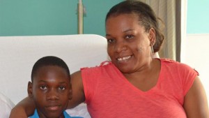 Phesaun McCalmon and his mother Shellon at Health City Cayman Islands