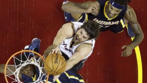 Kevin Love goes to work under the hoop between the Pacers' Ian Mahinmi and Jordan Hill.