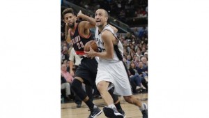 Manu Ginobili put the Spurs on his back in the fourth quarter, scoring 14 points to lead them past Portland.