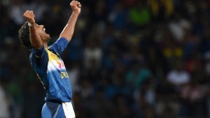 Sri Lanka's Sachithra Senanayake celebrates after taking the wicket of West Indies' Marlon Samuels during the first Twenty20 International cricket match at the Pallekele International Cricket Stadium in Pallekele on November 9, 2015