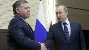 Russian President Vladimir Putin (R) shakes hands with Jordanian King Abdullah II during a meeting at the Bocharov Ruchei state residence in Sochi on November 24, 2015. 