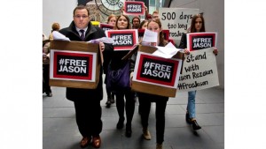 In this December 3, 2015 file photo, Ali Rezaian (left), the brother of Washington Post reporter Jason Rezaian, rallies with supporters to deliver a petition of 500,000 signatures to Iran’s United Nations mission asking for the release of his brother from prison. A source close to Iran’s judiciary confirmed to The Associated Press that Rezaian is one of four dual-national prisoners freed by Iran’s Government.