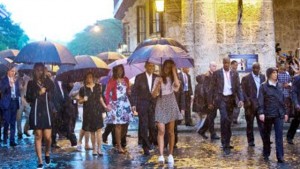 HAVANA, Cuba — US President Barack Obama (centre) with his first lady Michelle Obama, daughters Malia and Sasha, and first lady’s mother Marian Robinson, take a walking tour of Old Havana in the rain yesterday. Obama became the first US president to visit the island in nearly 90 years.