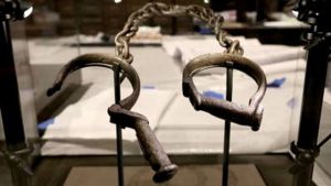A pair of slave shackles on display in the Smithsonian's National Museum of African American History and Culture