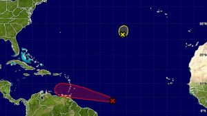 THE FIVE-DAY FORECAST OF THE TROPICAL WAVE (RED) WHICH LOOKS SET TO IMPACT THE CARIBBEAN THIS WEEK AND THERE’S A VERY GOOD CHANCE IT COULD DEVELOP INTO A STORM. THE REMNANTS OF TROPICAL STORM LISA ARE ABOVE. 