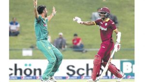 Pakistan bowler Sohail Khan (left) celebrates after bowling out West Indies’ Evin Lewis (out of picture) as West Indies’ Darren Bravo (right) reacts during the third T20I cricket match between Pakistan at the Sheikh Zayed Cricket Stadium in Abu Dhabi, yesterday