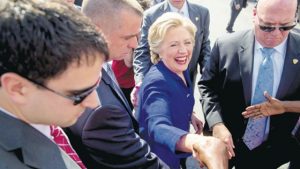 Democratic presidential candidate Hillary Clinton greets people outside an early voting centre in Lauderhill, Florida, yesterday. 