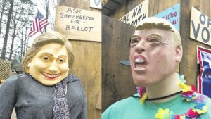 This mannequin of Democratic presidential candidate Hillary Clinton on display outside an outhouse used as an unofficial voting booth at Chris Owens’ farm yesterday in Ashland, New Hampshire. A week before election day, a New Hampshire farm stand owner has decided to tally customers’ votes for president from an outhouse-turned-fake-voting booth. The winner: Hillary Clinton AND A mannequin for Republican presidential candidate Donald Trump on display yesterday outside an outhouse used as an unofficial voting booth at Chris Owens’ farm in Ashland, New Hampshire.
