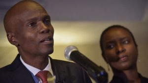 Jovenel Moise (L), presidential candidate of the PHTK political party, speaks following preliminary results in the first round of Haiti's presidential election on November 28, 2016 in the commune of Petion Ville, in the Haitian capital Port-au-Prince