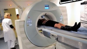 This file photo taken on February 06, 2013 shows a patient undergoing a scan, at the Oscar Lambret Center in Lille, northern France, a regional medical unit specialised in cancer's treatment