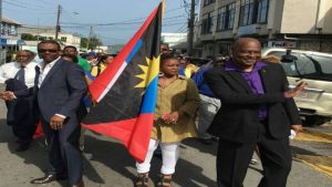 Wilmoth Daniel (front) marches with supporters in St John’s