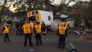 Chattanooga Fire Department personnel work the scene of a fatal elementary school bus crash in Chattanooga, Tennessee on Monday.