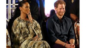 Britain's Prince Harry and Bajan singer Rihanna attend Golden anniversary celebrations at the Kensington Oval cricket ground, marking 50 years of the island's independence from England, in Bridgetown, Barbados yesterday.